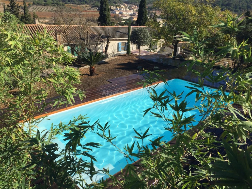 Piscine béton 7x3m blanc et aménagement extérieur Bizanet