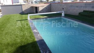 Piscine coque polyester Paradise 6×3,25m volet hors-sol à Canet