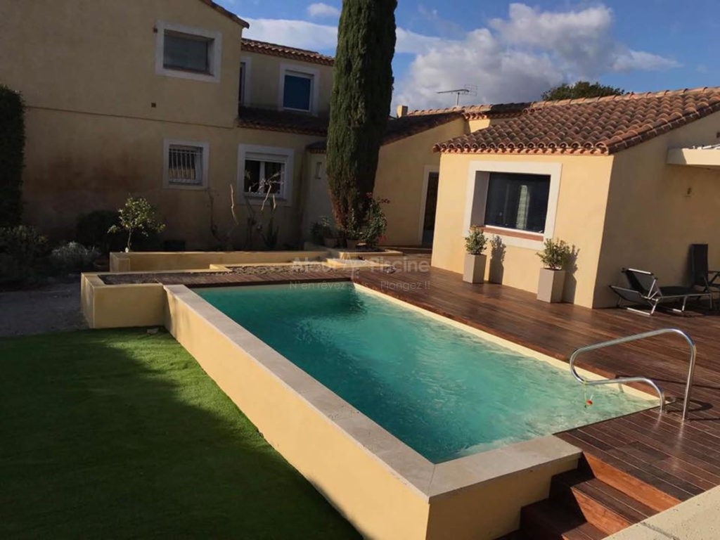 Piscine en béton 6,5x3m et aménagement extérieur Narbonne