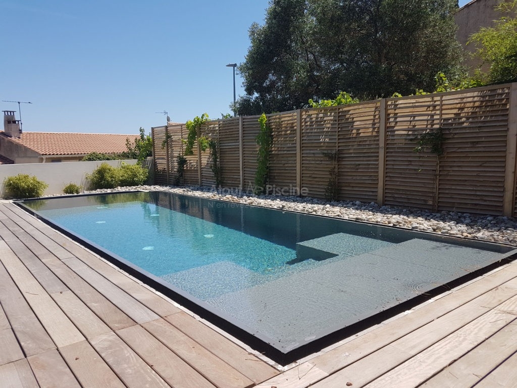 Piscine miroir 8x3m avec volet sous plage Narbonne